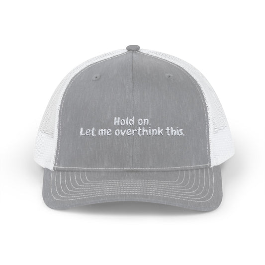 Hold on. Let me overthink this. Snapback Trucker Cap